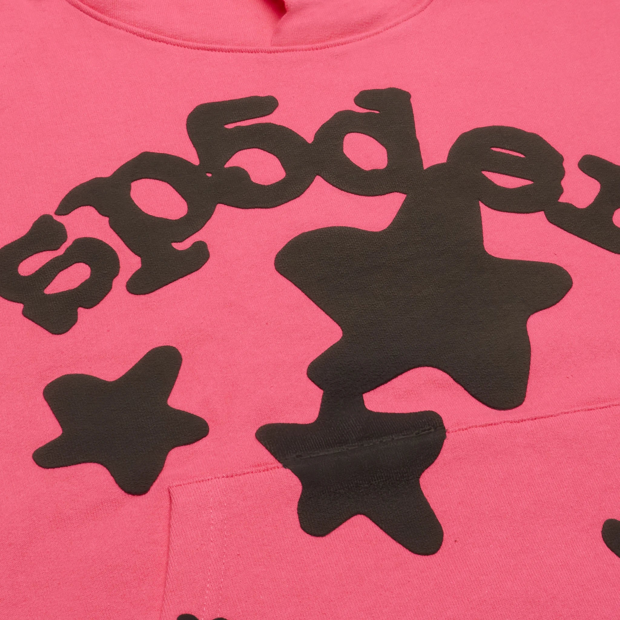 Close up of Sp5der Beluga Pink Hoodie